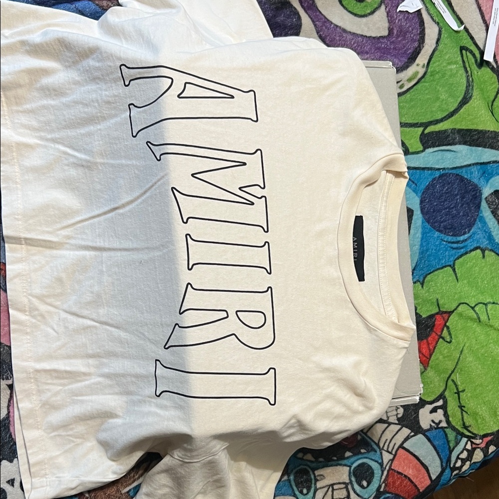 AMIRI Cream T-Shirt with Black Lettering